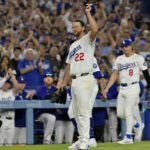 Jul 2, 2025; Los Angeles, California, USA; Los Angeles Dodgers starting pitcher Clayton Kershaw (22) acknowledges the crowd after striking out Chicago White Sox third baseman Vinny Capra (41) for his 3000th career strike at Dodger Stadium.