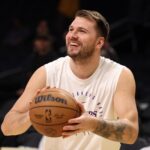 Mar 31, 2025; Los Angeles, California, USA; Los Angeles Lakers guard Luka Doncic (77) warms up before the game against the Houston Rockets at Crypto.com Arena.