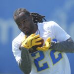 May 20, 2025; El Segundo, CA, USA; Los Angeles Chargers running back Najee Harris (22) catches the ball during offseason workouts at The Bolt.
