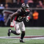 Aug 15, 2025; Atlanta, Georgia, USA; Atlanta Falcons linebacker James Pearce Jr. (27) rushes the passer against the Tennessee Titans in the second quarter at Mercedes-Benz Stadium.