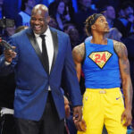 Feb 15, 2020; Chicago, Illinois, USA; Former NBA player Shaquille O'Neal laughs while standing next to Los Angeles Lakers player Dwight Howard during the slam dunk contest during NBA All Star Saturday Night at United Center. Mandatory Credit: Kyle Terada-USA TODAY Sports