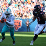 Nov 6, 2022; Chicago, Illinois, USA; NFL; Miami Dolphins wide receiver Tyreek Hill (10) makes a catch against Chicago Bears linebacker Jack Sanborn (57) during the second half at Soldier Field.