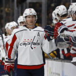 Feb 11, 2023; Boston, Massachusetts, USA; Washington Capitals center Nicklas Backstrom (19) is congratulated at the bench after scoring against the Boston Bruins during the first period at TD Garden. Mandatory Credit: Winslow Townson-USA TODAY Sports
