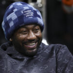 Jan 27, 2024; Coral Gables, Florida, USA; American professional basketball player John Wall attends the game between the Pittsburgh Panthers and the Miami Hurricanes at Watsco Center.