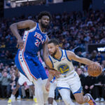 Jan 30, 2024; San Francisco, California, USA; NBA; Golden State Warriors guard Stephen Curry (30) drives against Philadelphia 76ers center Joel Embiid (21) during the fourth quarter at Chase Center.