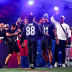 Feb 1, 2024; Orlando, FL, USA; Dallas Cowboys wide receiver CeeDee Lamb (88) and linebacker Micah Parsons (11) celebrate during the NFL Pro Bowl Skills Competition at the UCF NIcholson Fieldhouse.