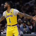 Apr 3, 2024; Washington, District of Columbia, USA; Los Angeles Lakers guard D'Angelo Russell (1) celebrates against the Washington Wizards at Capital One Arena.