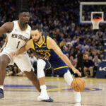 Apr 12, 2024; San Francisco, California, USA; Golden State Warriors guard Stephen Curry (30) dribbles around New Orleans Pelicans forward Zion Williamson (1) during the fourth quarter at Chase Center. Mandatory Credit: D. Ross Cameron-USA TODAY Sports