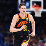 Apr 14, 2024; Oklahoma City, Oklahoma, USA; Oklahoma City Thunder center Mike Muscala (50) runs down the court against the Dallas Mavericks during the second half at Paycom Center. Mandatory Credit: Alonzo Adams-USA TODAY Sports