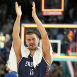 Aug 10, 2024; Paris, France; Serbia power forward Nikola Jokic (15) celebrates after their win against Germany in the men's basketball bronze medal game during the Paris 2024 Olympic Summer Games at Accor Arena.