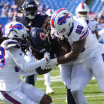 Aug 10, 2024; Orchard Park, New York, USA; NFL; Buffalo Bills cornerback Keni-H Lovely (38) and Buffalo Bills defensive end Kameron Cline (96) during the second half at Highmark Stadium.