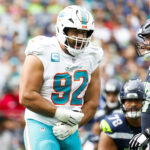 Sep 22, 2024; Seattle, Washington, USA; Miami Dolphins defensive tackle Zach Sieler (92) celebrates following a sack against the Seattle Seahawks during the second quarter at Lumen Field.