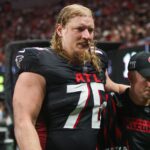 Sep 22, 2024; Atlanta, Georgia, USA; Atlanta Falcons offensive tackle Kaleb McGary (76) leaves the field with an injury against the Kansas City Chiefs in the second quarter at Mercedes-Benz Stadium.