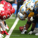 Cazé TV Sep 29, 2024; Inglewood, California, USA; Kansas City Chiefs and Los Angeles Chargers helmets at the line of scrimmage as Chargers long snapper Josh Harris (47) snaps the ball at SoFi Stadium. Mandatory Credit: Kirby Lee-Imagn Images
