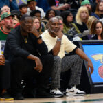 Oct 11, 2024; Seattle, Washington, USA; Former NBA players Shawn Kemp and Gary Payton watch the game between the Los Angeles Clippers and the Portland Trail Blazers during the first half at Climate Pledge Arena.