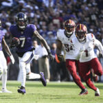 Oct 13, 2024; Baltimore, Maryland, USA; NFL; Baltimore Ravens wide receiver Rashod Bateman (7) runs after a catch during the second half against the Washington Commanders at M&T Bank Stadium.