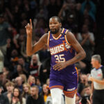 Nov 6, 2024; Phoenix, Arizona, USA; Phoenix Suns forward Kevin Durant (35) celebrates a basket against the Miami Heat during the second half at Footprint Center.