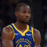 Jonathan Kuminga Warriors impasse Oct 30, 2024; San Francisco, California, USA; Golden State Warriors forward Jonathan Kuminga (00) walks upcourt during a pause in the action against the New Orleans Pelicans in the fourth quarter at Chase Center.