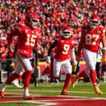 Dec 21, 2024; Kansas City, Missouri, USA; Kansas City Chiefs quarterback Patrick Mahomes (15) celebrates with tight end Travis Kelce (87) and wide receiver JuJu Smith-Schuster (9) after scoring a touchdown during the first half against the Houston Texans at GEHA Field at Arrowhead Stadium. Mandatory Credit: Jay Biggerstaff-Imagn Images