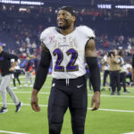 Dec 25, 2024; Houston, Texas, USA; Baltimore Ravens running back Derrick Henry (22) smiles after the game against the Houston Texans at NRG Stadium. Mandatory Credit: Troy Taormina-Imagn Images