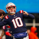 Jan 5, 2025; Foxborough, Massachusetts, USA; NFL; New England Patriots quarterback Drake Maye (10) warms up before the start of the game against the Buffalo Bills at Gillette Stadium.
