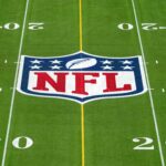 Apostas NFL Feb 1, 2025; Orlando, FL, USA; An overall view of the NFL shield logo at midfield on the Camping World Stadium flag football field. Mandatory Credit: Kirby Lee-Imagn Images