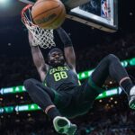 Neemias Queta Celtics Portugal Feb 6, 2025; Boston, Massachusetts, USA; Boston Celtics center Neemias Queta (88) makes the basket against the Dallas Mavericks in the second half at TD Garden. Mandatory Credit: David Butler II-Imagn Images