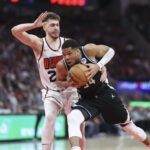 Feb 25, 2025; Houston, Texas, USA; Milwaukee Bucks forward Giannis Antetokounmpo (34) drives with the ball as Houston Rockets center Alperen Sengun (28) defends during the fourth quarter at Toyota Center. Mandatory Credit: Troy Taormina-Imagn Images