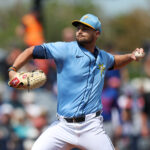 Mar 1, 2025; Port Charlotte, Florida, USA; Tampa Bay Rays pitcher Shane McClanahan (18) throws a pitch against the New York Mets in the first inning during spring training at Charlotte Sports Park. Mandatory Credit: Nathan Ray Seebeck-Imagn Images