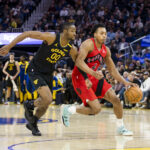 Mar 20, 2025; San Francisco, California, USA; Toronto Raptors forward Scottie Barnes (4) drives to the basket as Golden State Warriors forward Jonathan Kuminga (00) defends during the fourth quarter at Chase Center.