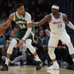 Giannis Apr 5, 2025; Miami, Florida, USA; Milwaukee Bucks forward Giannis Antetokounmpo (34) looks to shoot as Miami Heat center Bam Adebayo (13) defends during the first half at Kaseya Center. Mandatory Credit: Jim Rassol-Imagn Images