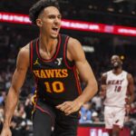 Risacher Hawks Apr 18, 2025; Atlanta, Georgia, USA; Atlanta Hawks forward Zaccharie Risacher (10) reacts after scoring a basket against the Miami Heat during the first half at State Farm Arena. Mandatory Credit: Dale Zanine-Imagn Images