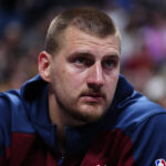 Apr 19, 2025; Denver, Colorado, USA; Denver Nuggets center Nikola Jokic (15) on the bench in fourth quarter against the LA Clippers at Ball Arena.