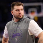 Apr 22, 2025; Los Angeles, California, USA; Los Angeles Lakers guard Luka Doncic (77) looks on before a game two of first round for the 2024 NBA Playoffs against the Minnesota Timberwolves at Crypto.com Arena. Mandatory Credit: Kiyoshi Mio-Imagn Images