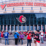 May 1, 2025; Ottawa, Ontario, CAN; Fans congregate in the Red Zone at the Canadian Tire centre ahead of game six of the first round of the 2025 Stanley Cup Playoffs between the Toronto Maple Leafs and the Ottawa Senators. Mandatory Credit: Marc DesRosiers-Imagn Imagesowels are placed on all the seats at