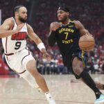 May 4, 2025; Houston, Texas, USA; Golden State Warriors guard Buddy Hield (7) dribbles the ball as Houston Rockets forward Dillon Brooks (9) defends during the first quarter of game seven of the first round for the 2025 NBA Playoffs at Toyota Center. Mandatory Credit: Troy Taormina-Imagn Images