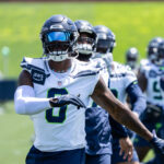 Jun 11, 2025; Renton, WA, USA; Seattle Seahawks defensive end DeMarcus Lawrence (0) takes part in drills during mini-camp at Virginia Mason Athletic Center. Mandatory Credit: Stephen Brashear-Imagn Images