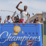 Oklahoma City Thunder guard Shai Gilgeous-Alexander gestures to the crowd as the Oklahoma City Thunder celebrate their first NBA Finals title