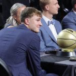 Jun 25, 2025; Brooklyn, NY, USA; Cooper Flagg looks on during the 2025 NBA Draft at Barclays Center.