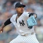 Jul 10, 2025; Bronx, New York, USA; New York Yankees starting pitcher Marcus Stroman (0) pitches against the Seattle Mariners during the first inning at Yankee Stadium