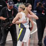 WNBA; Indiana Fever guard Caitlin Clark (22) and Dallas Wings guard Paige Bueckers (5) hug Sunday, July 13, 2025, ahead of the game at Gainbridge Fieldhouse in Indianapolis.