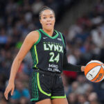 Jul 25, 2025; Minneapolis, Minnesota, USA; Minnesota Lynx forward Napheesa Collier (24) dribbles against the Las Vegas Aces in the third quarter at Target Center.