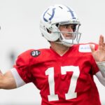 Indianapolis Colts quarterback Daniel Jones (17) delivers a pass Monday, July 28, 2025, during training camp held at Grand Park in Westfield.