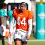Jul 29, 2025; Miami Gardens, FL, USA; Miami Dolphins linebacker Chop Robinson (44) walks on the field during training camp at Baptist Health Training Complex.