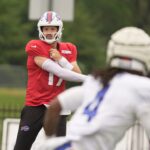 Buffalo Bills quarterback Josh Allen throws a short pass to running back James Cook during a drill at Bills Training Camp at St. John Fisher University in Pittsford on July 31, 2025.