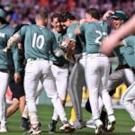 Aug 1, 2025; Boston, Massachusetts, USA; Boston Red Sox left fielder Roman Anthony (19) (B on sleeve) celebrates defeating the Houston Astros during at Fenway Park with teammates. Mandatory Credit: Eric Canha-Imagn Images