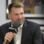 Aug 2, 2025; El Segundo, CA, USA; Los Angeles Lakers Luka Doncic (77) is interviewed Spectrum SportsNet following a press conference announcing the signing of his contract extension at UCLA Health Training Center.