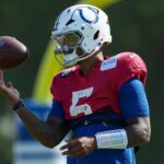 Indianapolis Colts quarterback Anthony Richardson Sr. (5) spins the ball on his finger Sunday, Aug. 3, 2025, during Indianapolis Colts Training Camp at Grand Park in Westfield.