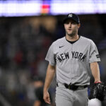Aug 4, 2025; Arlington, Texas, USA; New York Yankees relief pitcher Jake Bird (59) walks off the field after he gives up the game winning home run to Texas Rangers designated hitter Josh Jung (not pictured) during the tenth inning at Globe Life Field. Mandatory Credit: Jerome Miron-Imagn Images