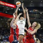 Kamilla Cardoso Aug 5, 2025; Chicago, Illinois, USA; Chicago Sky center Kamilla Cardoso (10) shoots against the Washington Mystics during the first half at Wintrust Arena. Mandatory Credit: Kamil Krzaczynski-Imagn Images